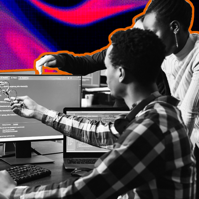 Sitecore Developers working together on multiple monitors