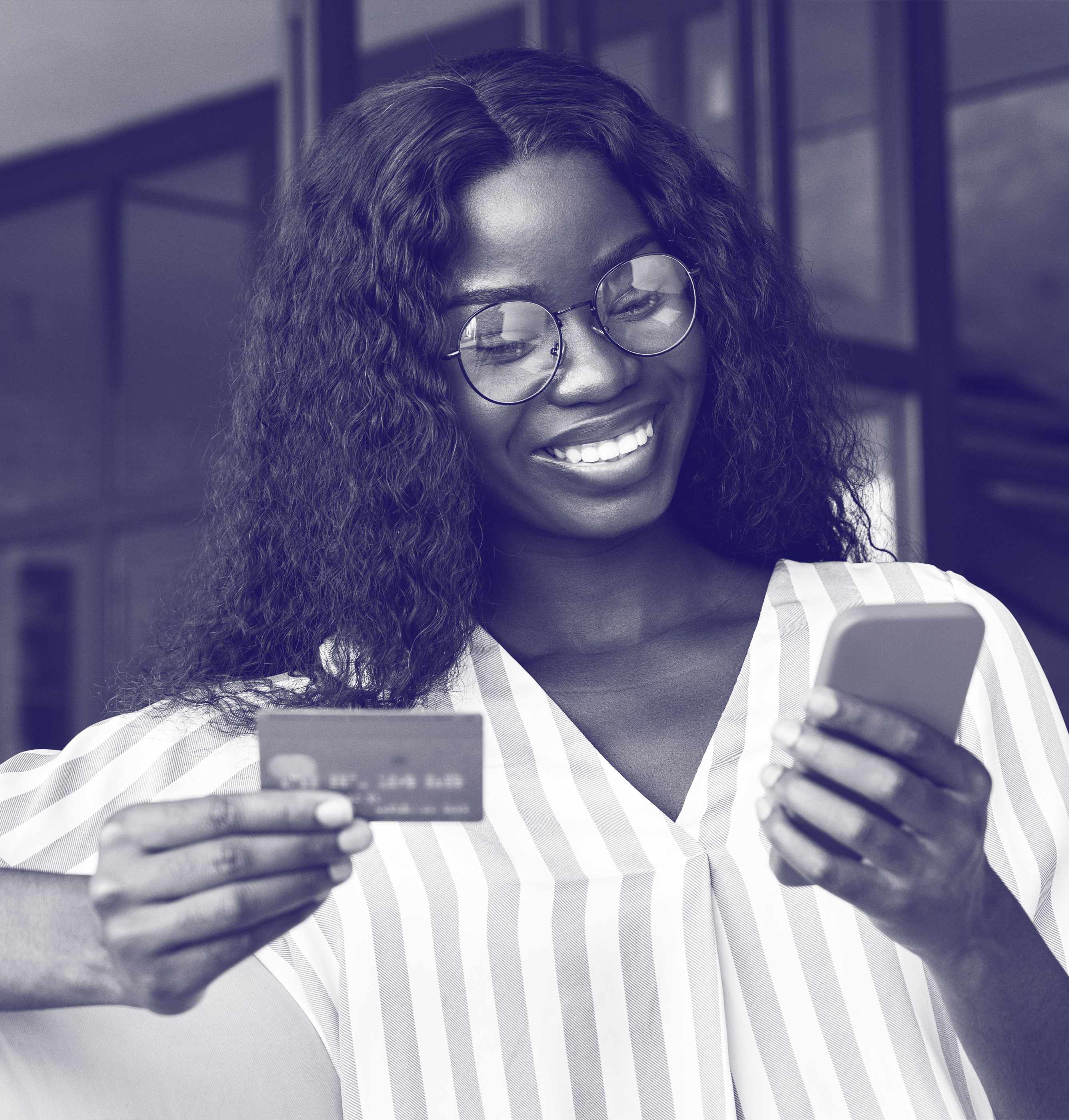 Young woman online purchasing with her smartphone